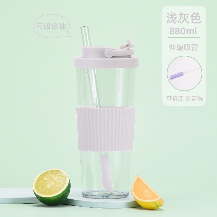 

Single-Layer Tritan Straw Cup Suction Pearl Belt Waist Cover Milk Tea Cup Portable Handle Retractable Straw Water Cup 880ml світло-сірого кольору