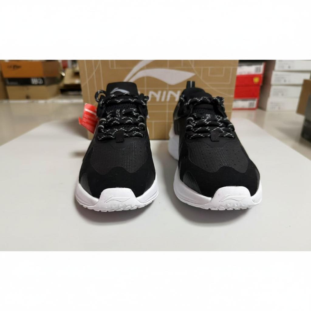 Li-Ning Zapatos Casuales Cómodos Simples Absorción de Impactos Antideslizantes de Caña Baja Zapatillas de Hombre Negro AGLU175-1