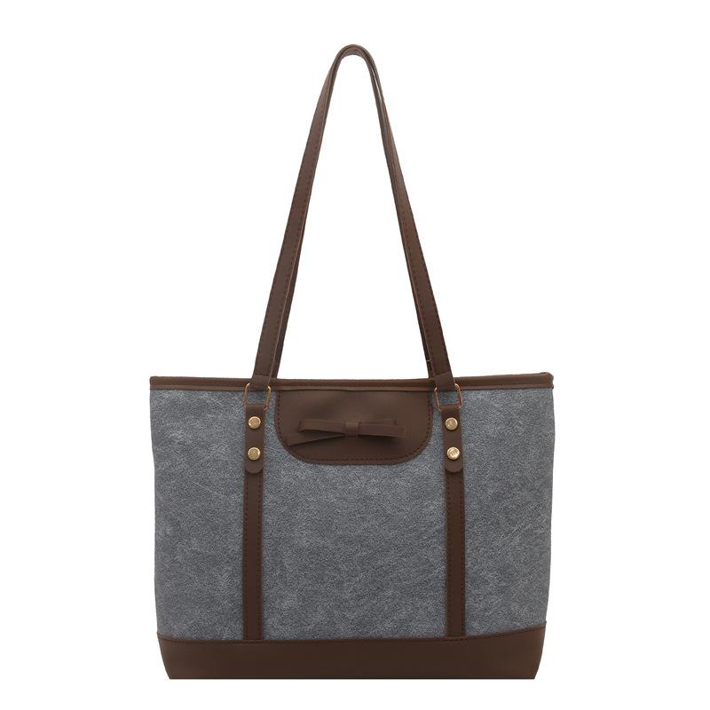Fashion commuter largecapacity bag women's spring new foreignstyle shoulder bag college student portable tote bag