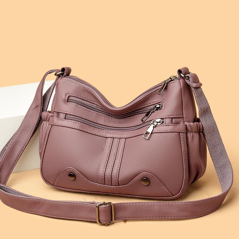 

Элегантная сумка кроссбоди из мягкой кожи для зрелых женщин - Вместительный рюкзак через плечо фиолетовый