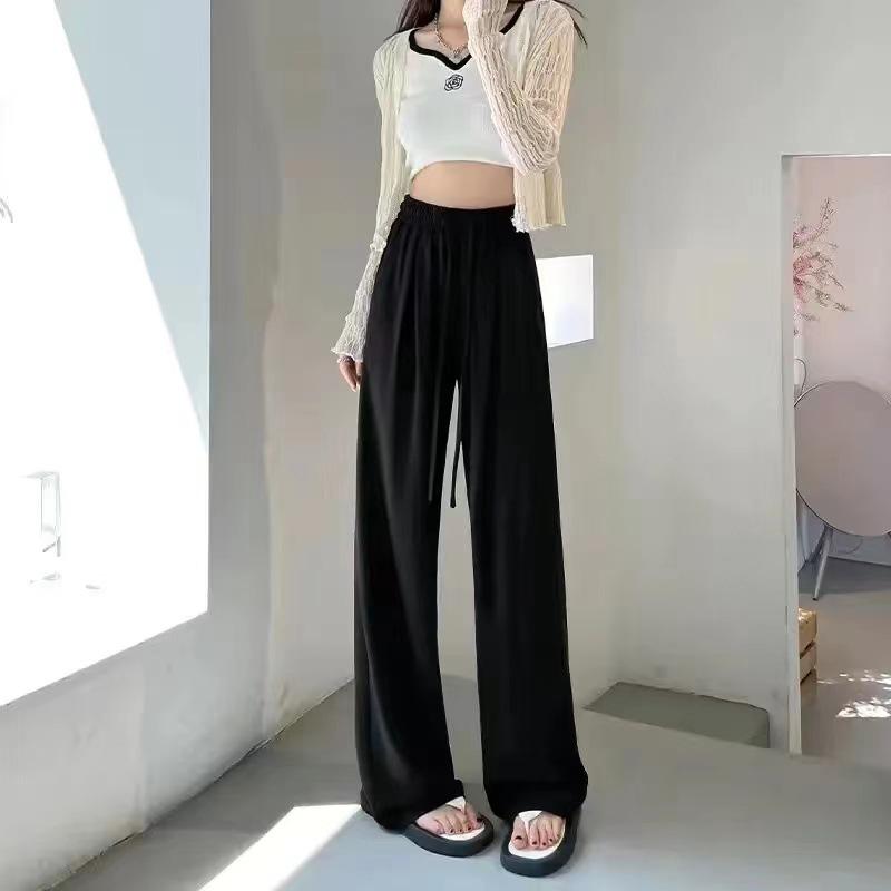 

Женские черные брюки с высокой посадкой, широкими штанинами, драпировкой из ледяного шелка - издание лето 2024 Double Extra Large