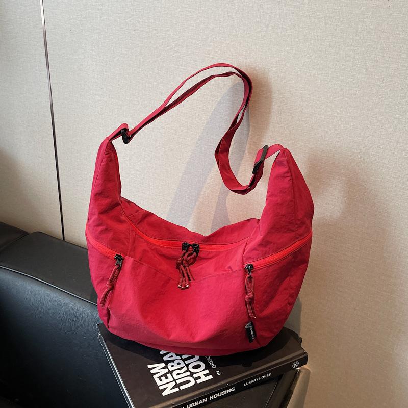 Large-capacity bag women's summer new niche design shoulder messenger bag simple commuter dumpling bag