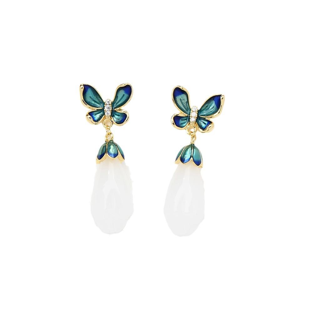 Elegant and elegant blue dripping butterfly stud earrings with simple temperament white magnolia flower imitation jade earrings silver needle women's