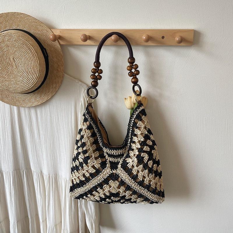 

Fashion niche woven portable tote bag women s bag summer new contrasting color shoulder bag casual underarm bag чорний