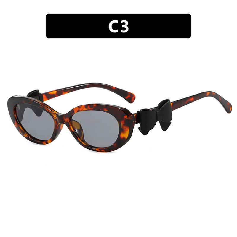 Fashion cat eye sunglasses bow decorative sunglasses women's high-end street photo UV-proof sunglasses
