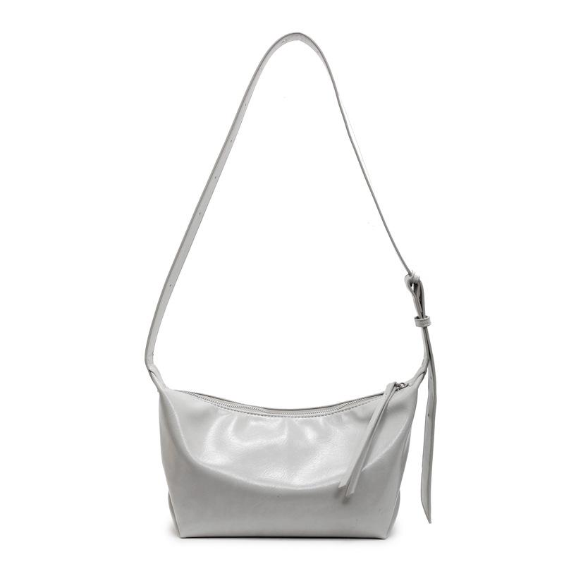 Móda a populární ležérní jednobarevná ležérní jednoduchá přenosná podpažní taška přes rameno nová taška ve tvaru knedlíku