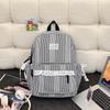 Schoolbag Korean simple casual striped schoolbag female junior high school student backpack large capacity class commuter travel backpack