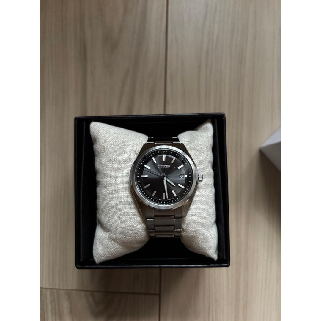 Citizen light-powered eco-drive radio clock AS1080-65E with bonus