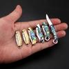 7.2cm Shell Brass Steel Folding Knife Pocket Keychain Portable Resin Steel Knives Survival EDC Tool Cutter Peeler Hunting Gift