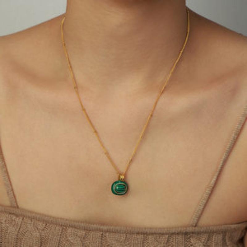 

Meier Palace style retrostylish titanium steel gold-plated colored glaze white shell malachite pendant necklace