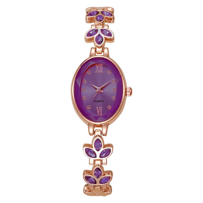 Luxury Rhinestone Women's Wristwatch with Round Dial and Colored Diamond Bracelet.