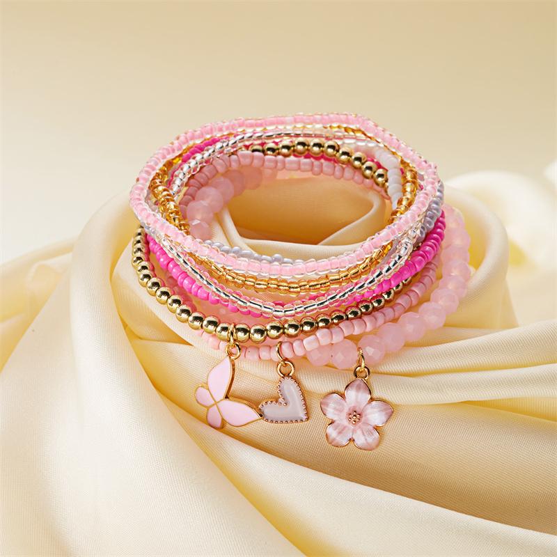 Set da 9 pezzi con Ciondoli a Forma di Farfalla, Fiore, Cuore con Perline, Braccialetti con Catena e Corda Elastica, Gioielli Regalo per Donna