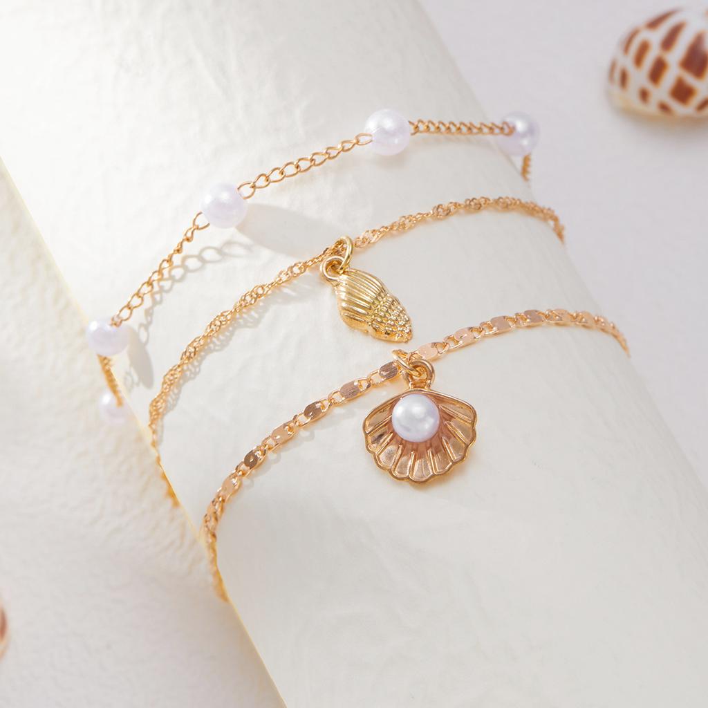 Simple thin chain stacked with imitation pearl foot jewelry, ocean vacation style starfish conch anklet women