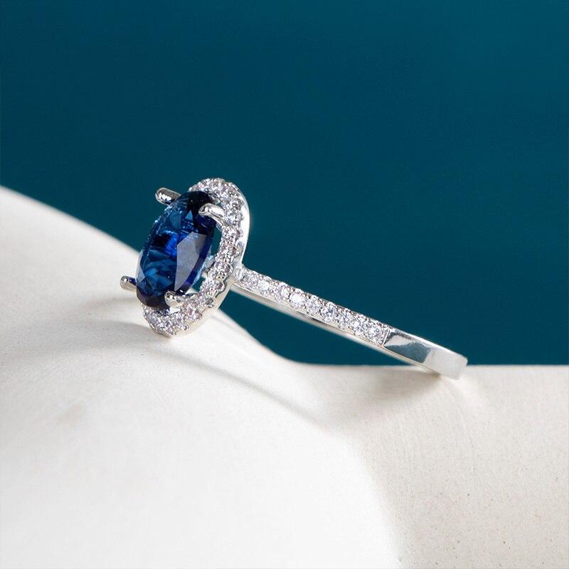 BELLA BOX Klassischer Damenring mit ovaler Form, blauen Edelsteinen, Zirkon, silberfarben, Finger, Hochzeit, Verlobung, Brautschmuck