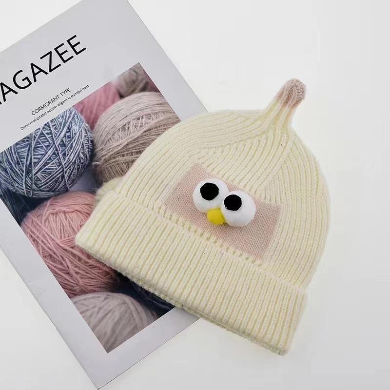 Autumn and winter children's hats baby beige series boys and girls windproof ear protection warm knitted cartoon ear warm