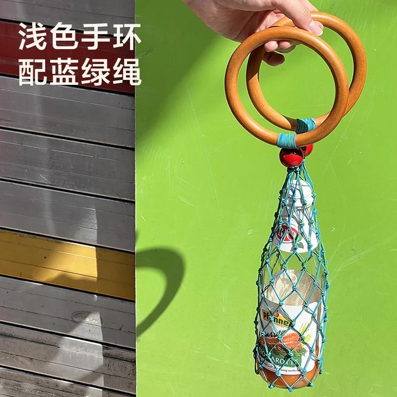 

Handheld Wine Bottle Storage Bag,wooden Ring Wine Bag,hand Woven Mesh Bag Cover,Chill Relaxation Feeling,City Vacation Organizer