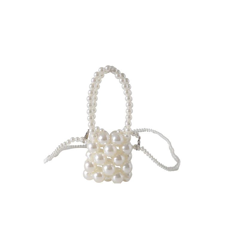

Stylish and compact mini imitation pearl hollow women s change mouth red envelope spring new shoulder messenger bag
