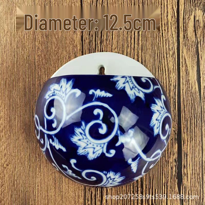 Hand-Painted Blue and White Ceramic Wall Vase with Floral and Bird Design