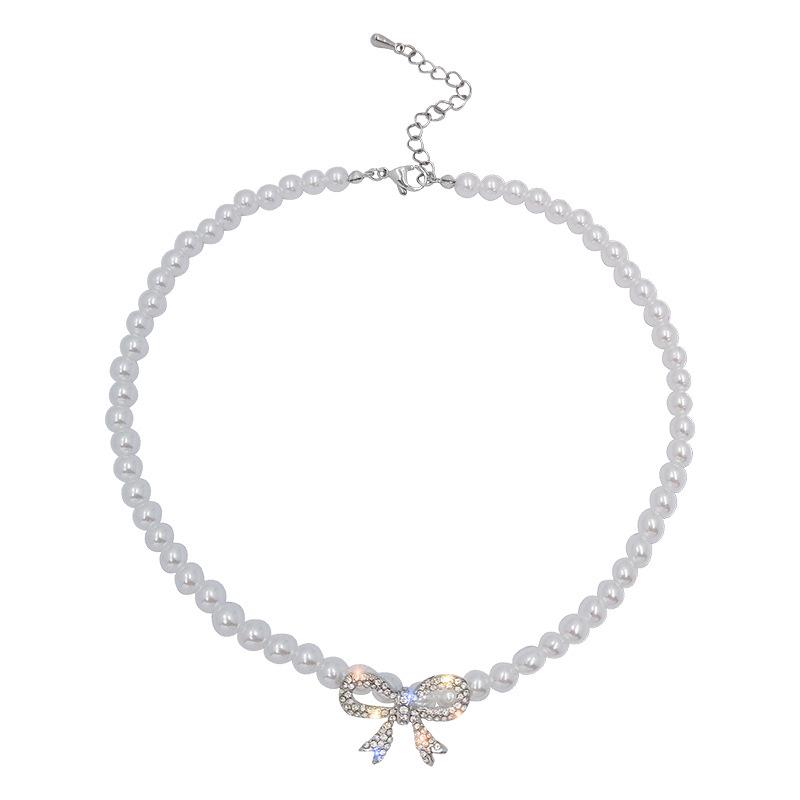 2025 Pearl Bow Clavicle Necklace: Elegant & Trendy Women's Choker