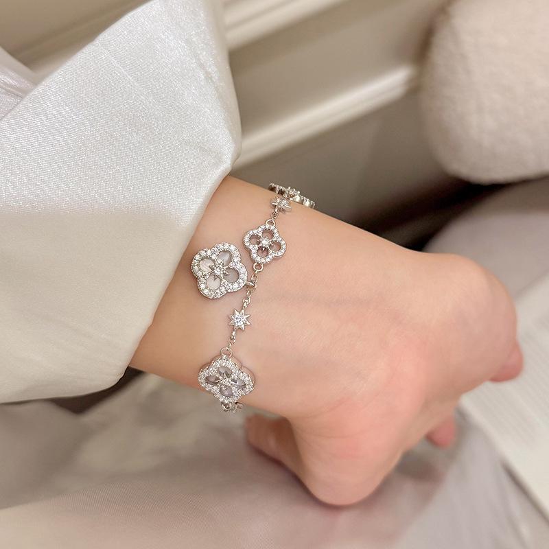 Adjustable Four-Petal Zircon Flower Bracelet - Elegant Hand Jewelry for Women, 2026