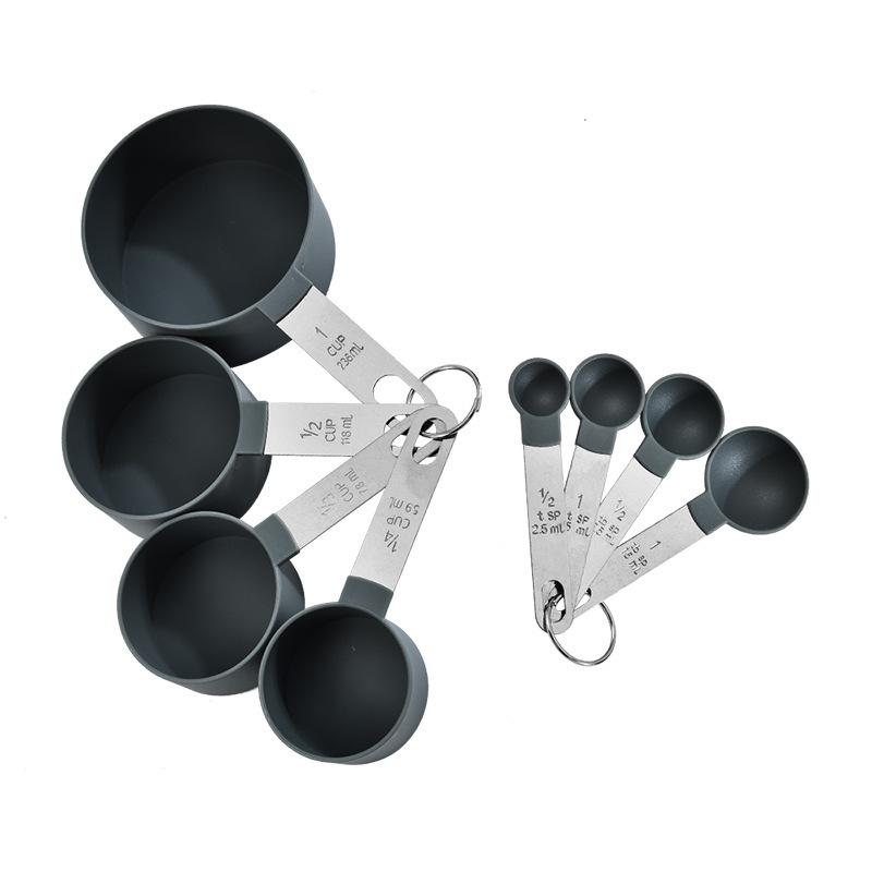 

8-Piece Stainless Steel Measuring Cups and Spoons Set with Plastic Scoops for Baking.