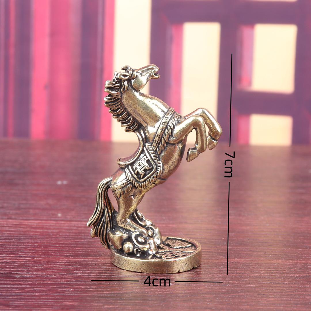 

Retro Brass Yuanbao War Horse Tea Pet - Zodiac Money Stepping Horse Ornament for Desktop Home Decor.