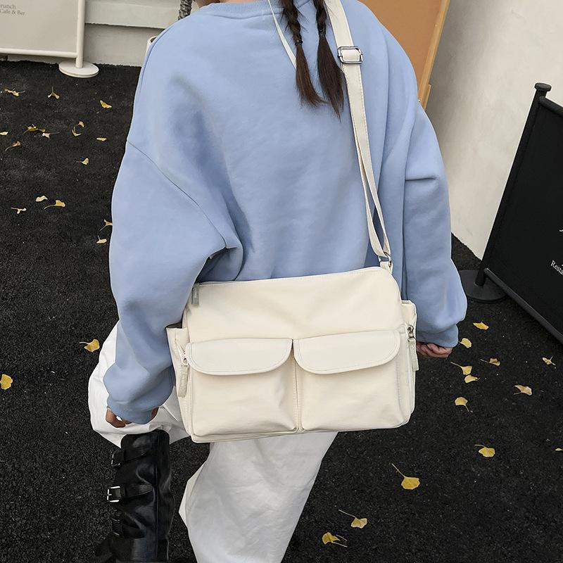 2025 Japan and South Korea new double pocket nylon small fresh casual messenger bag versatile niche bag underarm shoulder bag