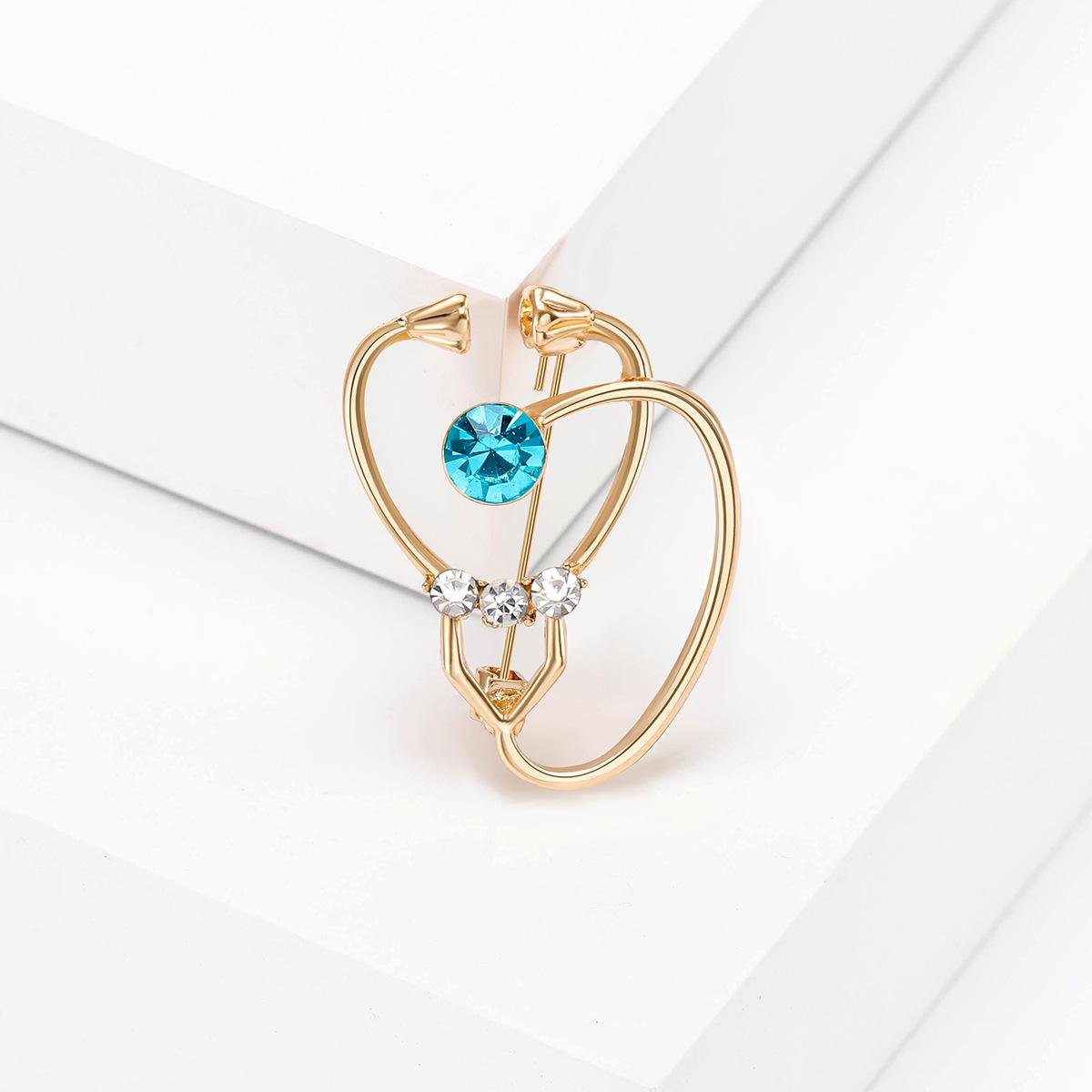 

Мода Творческая личность Доктор Стетоскоп Брошь Простые аксессуары для одежды Кардиган Анти-свет Корсаж