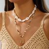Unisex Boho Surfer Layered Necklace for Women Man Cowrie Shell Choker Tribal Wood Bead Sun Pendant Summer Beach Vacation Jewelry