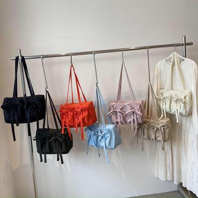 Sac à Bandoulière en Nylon Style Preppy pour Femme avec Nœud Couleur Unie Polyvalent Fermeture Éclair Sac Fourre-tout Doux pour Trajets & Sorties Décontractées KTY