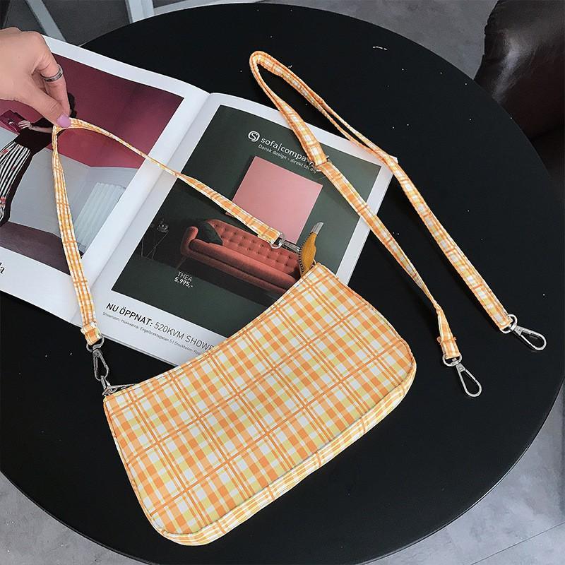 

Simple Western-style Orange Plaid Bag Small Red Book Same Crescent Shaped Artistic Stick Single Shoulder Underarm