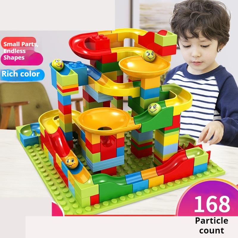 Fun Children'S Ball Slide Track Building Blocks Assembled With Ball-Sized Granular Toys To Assemble Holiday Gifts.