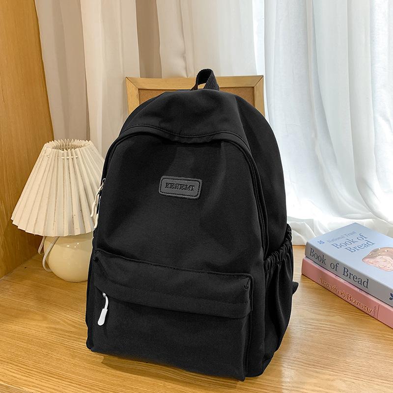 Japanese Casual Versatile Junior High School Student Schoolbag Female Campus Commuter Backpack Lightweight High School College Student Backpack Male