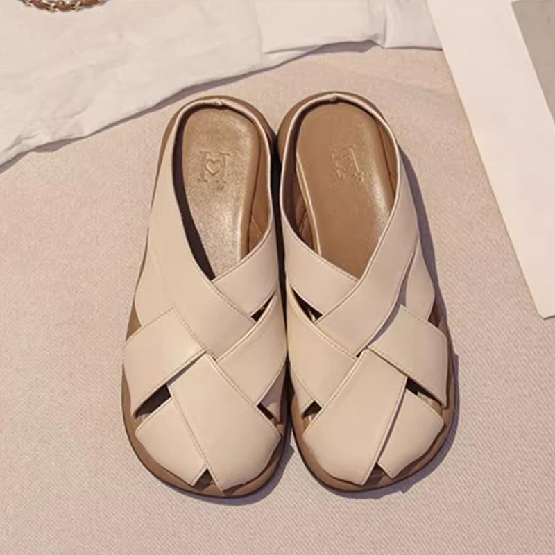 2025 new summer wear design sense woven flat-bottomed bag head slippers women's retro hollow versatile casual sandals