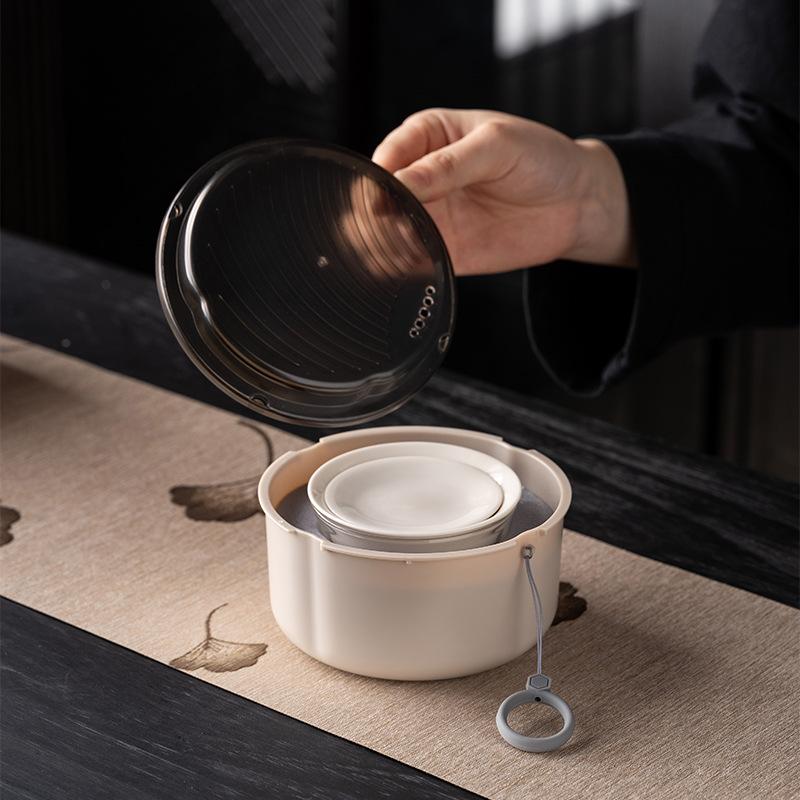 Light luxury tea table, outdoor kung fu travel tea set plant gray fast guest gaiwan three cups business commemorative souvenir