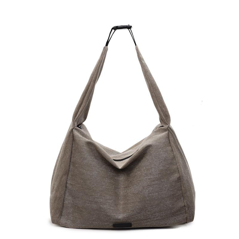 Japanese commuter canvas bag women's 2025 autumn new fashion simple trendy large-capacity college student shoulder tote bag