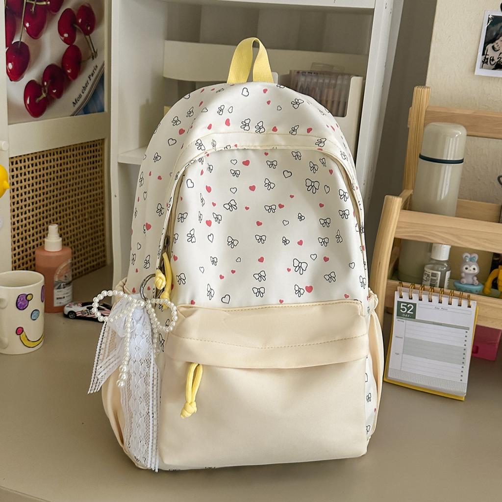 Schoolbag Junior high school bow high value niche 1011 new girl heart large capacity lightweight versatile backpack