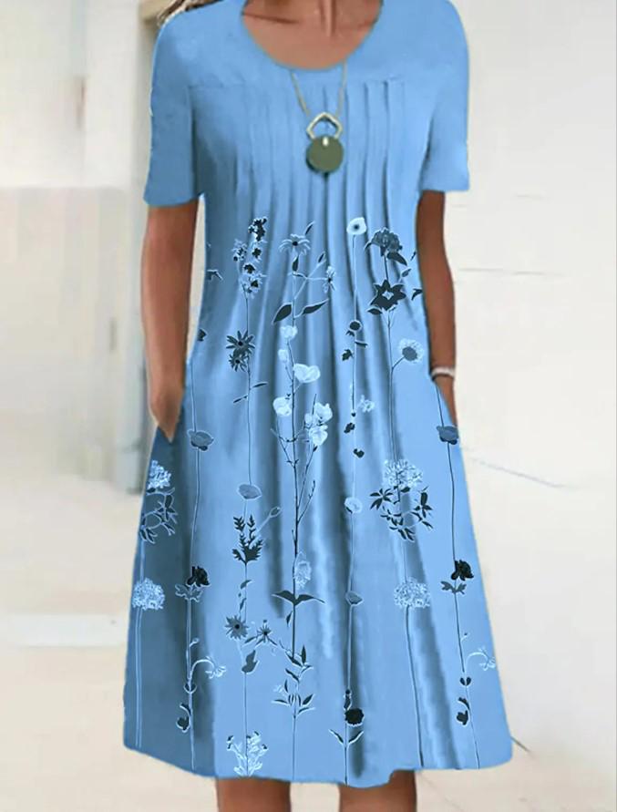 

Весенне-летнее миди-платье с цветочным принтом и карманами XL