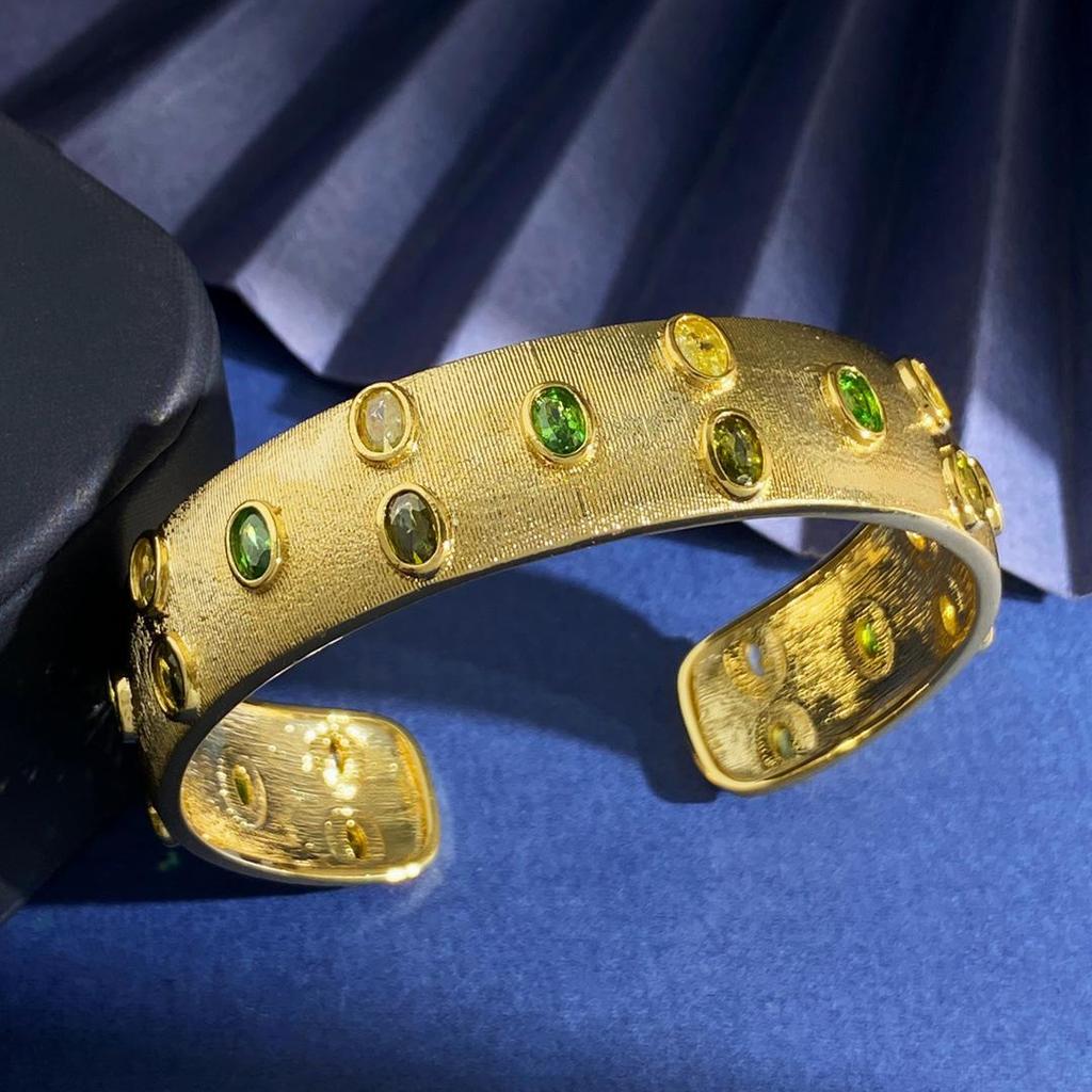 Brushed Gold-Plated C-Shaped Bracelet with Oval Gem