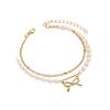 Elegant French-Inspired Imitation Pearl Beaded Anklet with Bow Pendant - Double Layer Women's Fashion Accessory.