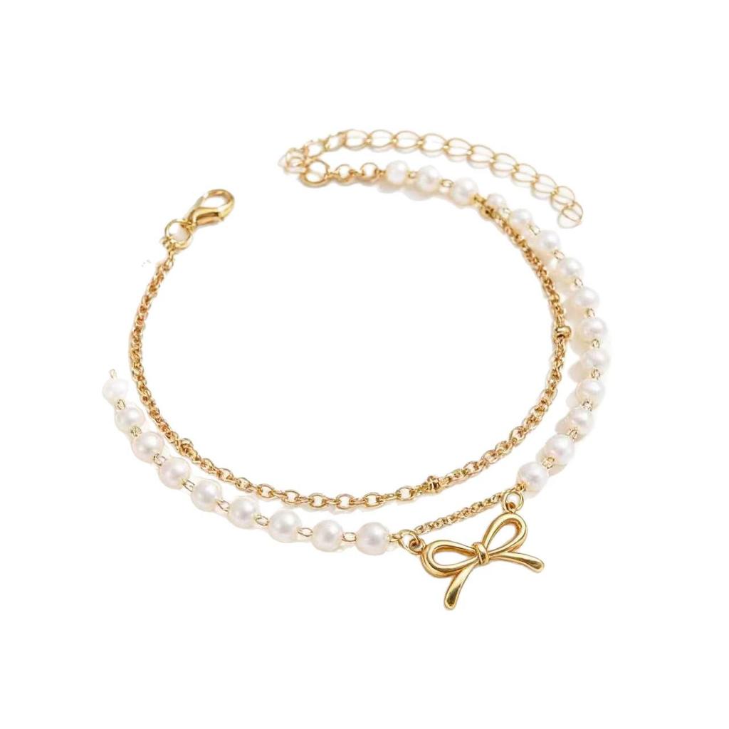 Elegant French-Inspired Imitation Pearl Beaded Anklet with Bow Pendant - Double Layer Women's Fashion Accessory.