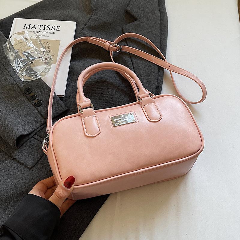 2025 new Korean version fashion simple commuter gloves bowling bag commuter versatile niche trend messenger women's bag