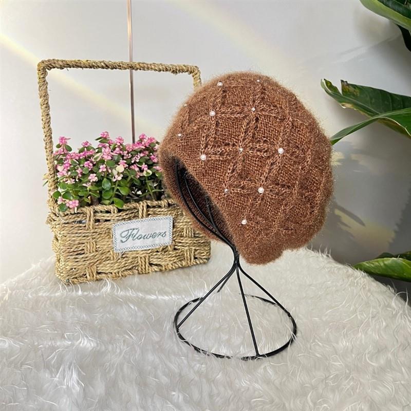 Korean version of fashion pearl headgear ear protection knitted heap hat winter handmade thickened warm mother wool hat women