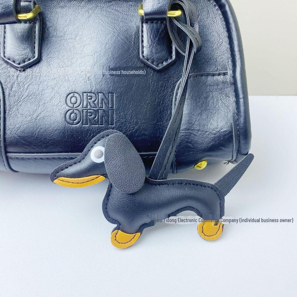 Dackel-Schlüsselanhänger aus PU-Leder: Niedliches grenzüberschreitendes Autozubehör und kreatives Taschenornament.