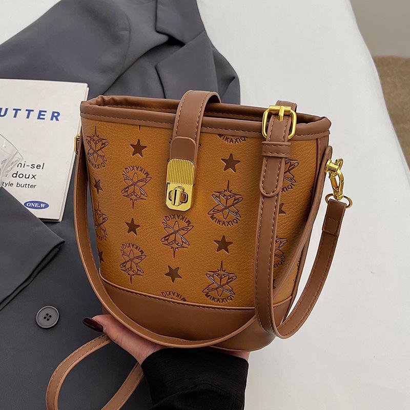 

This year s popular fashion temperament embossed high-end sense portable bucket bag versatile commuter women s messenger bag