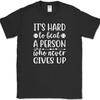 It's Hard To Beat A Person Who Never Gives Up T-Shirt Funny Humor Novelty Tee