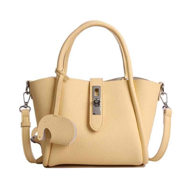 

Сумка премиум-текстуры, женская новая нишевая наплечная сумка-ведро кроссбоди, сумка-тоут для通勤 в виде овощной корзины жёлтый