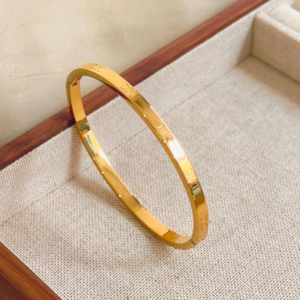 Luxusní dámský náramek z titanové oceli se zirkony a akcenty z bílé perleti