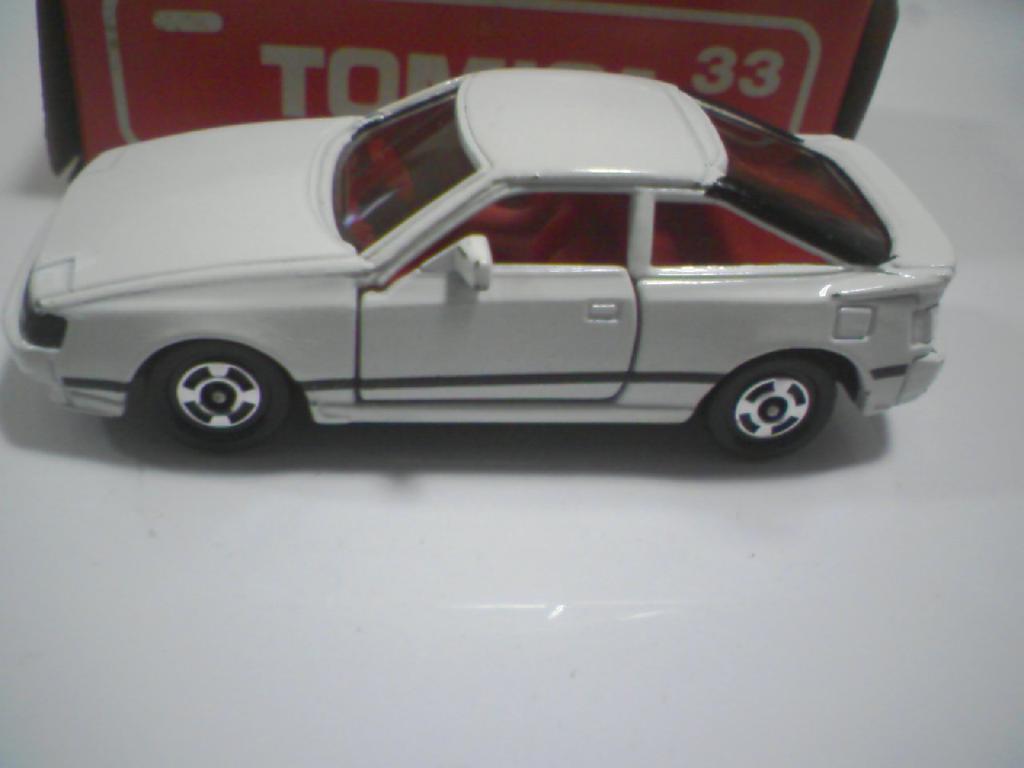 Tomica Made in Japan 33 Toyota Celica scale white with red TOMY logo 1/58