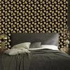 Black and Gold Tropical Pattern Wallpaper In Black, Ochre and Gold 50x1000